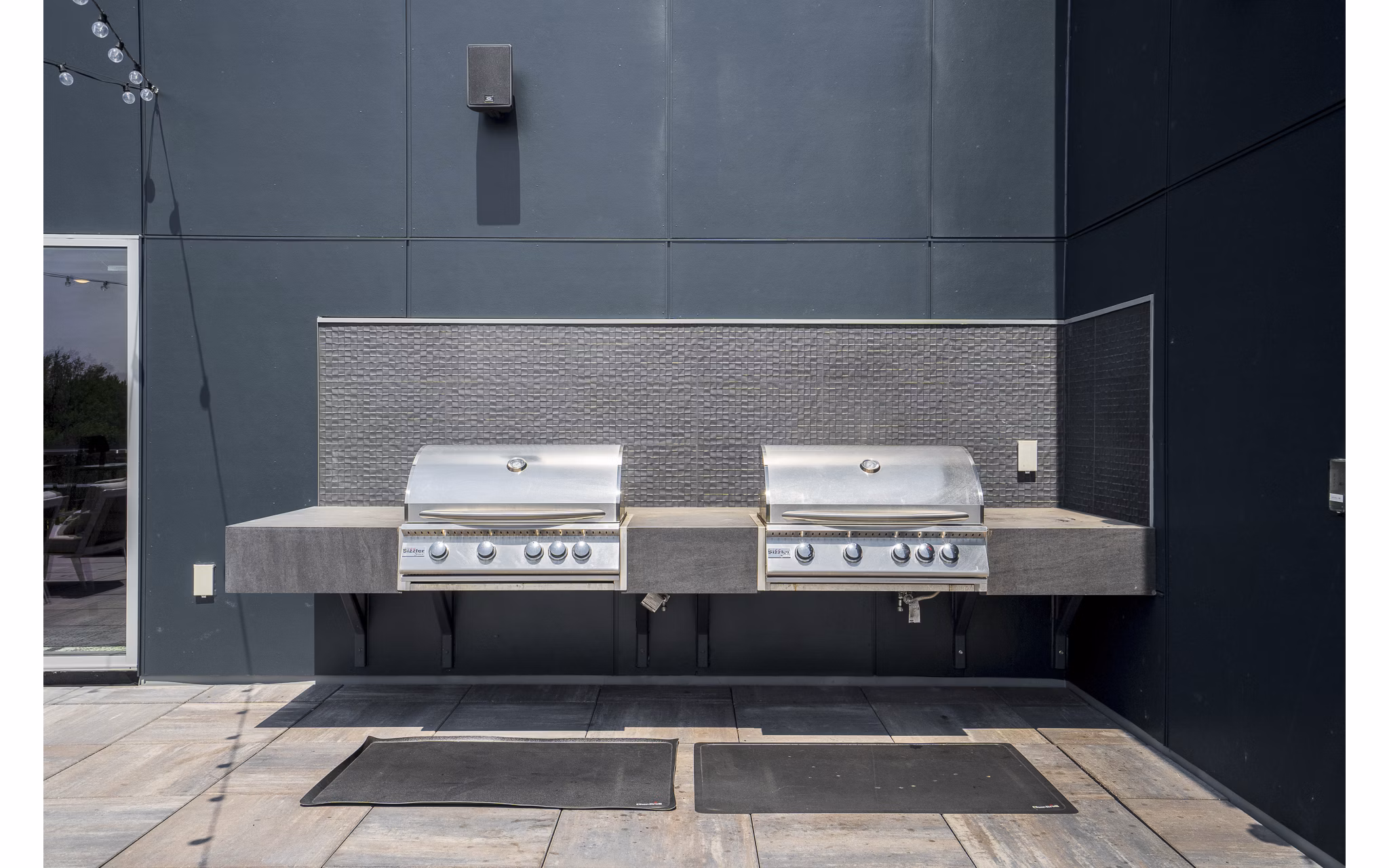 grill area/patio at Harvest Apartments