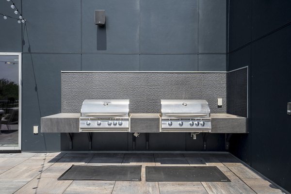 grill area/patio at Harvest Apartments