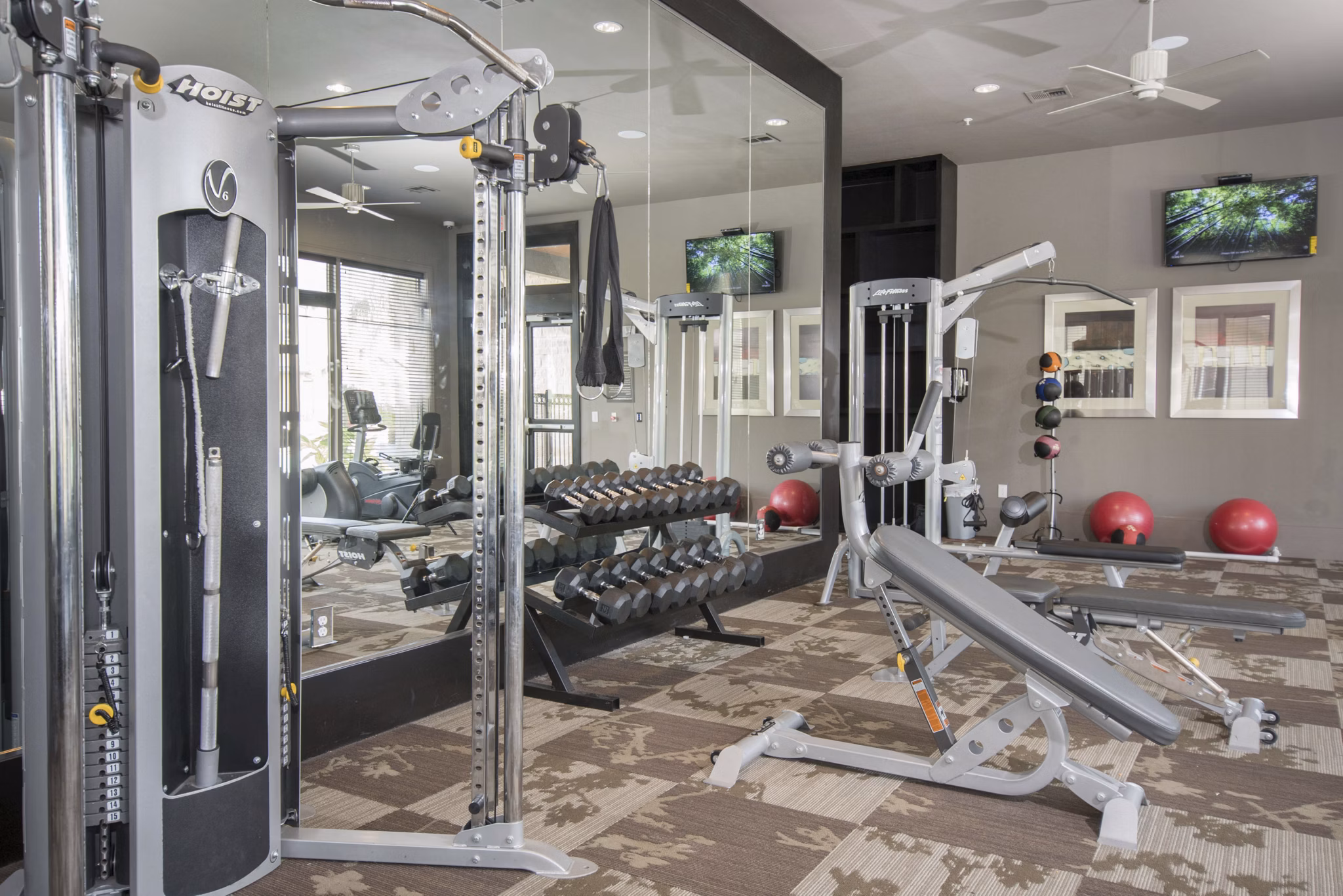 fitness center at Ten Pines at Summerwood Apartments 