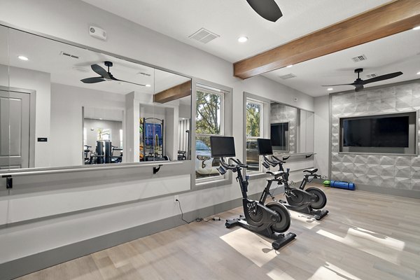 fitness center at Solamar Wildwood Apartments