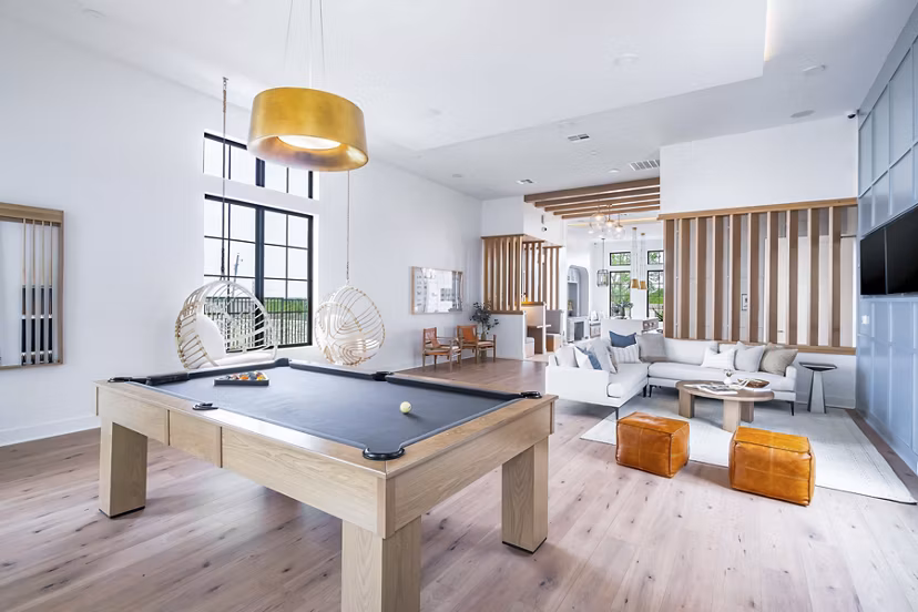 clubhouse game room at Citizen House Blue Bluff Apartments