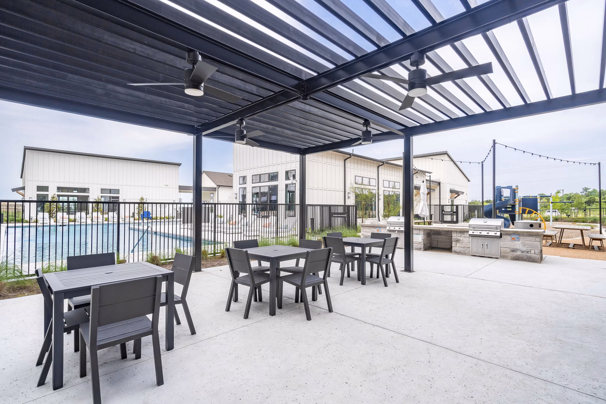 grill area/patio at Citizen House Blue Bluff Apartments