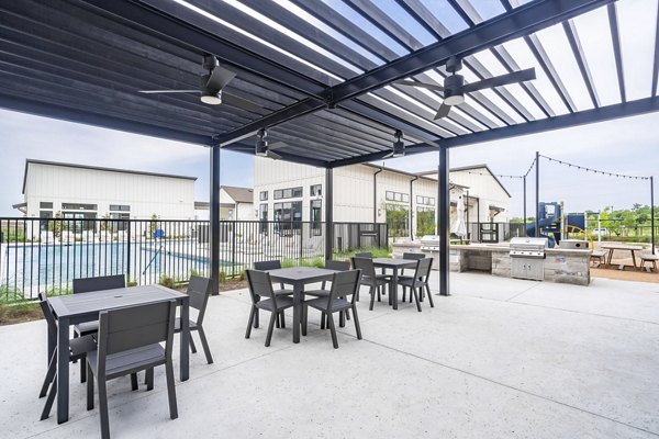 grill area/patio at Citizen House Blue Bluff Apartments