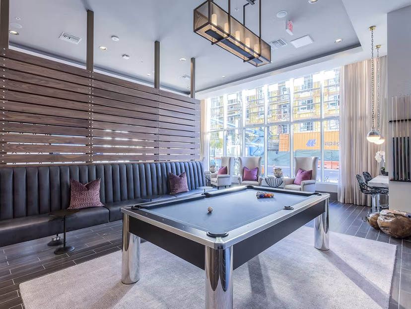 clubhouse game room at The Adeline Apartments