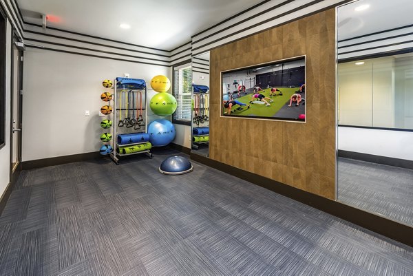 fitness center at Solamar Apartment Homes Kissimmee Apartments 