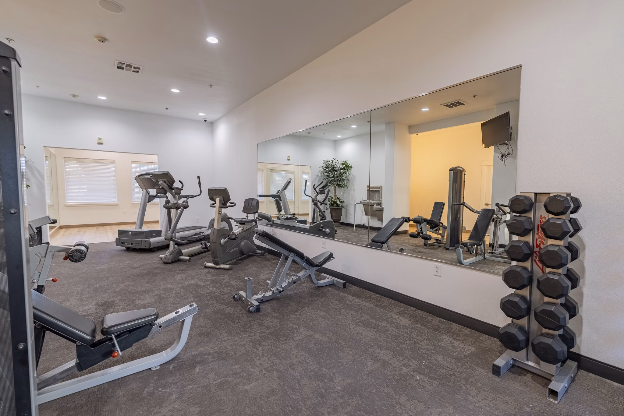 fitness center at Monticello at Southport Apartments