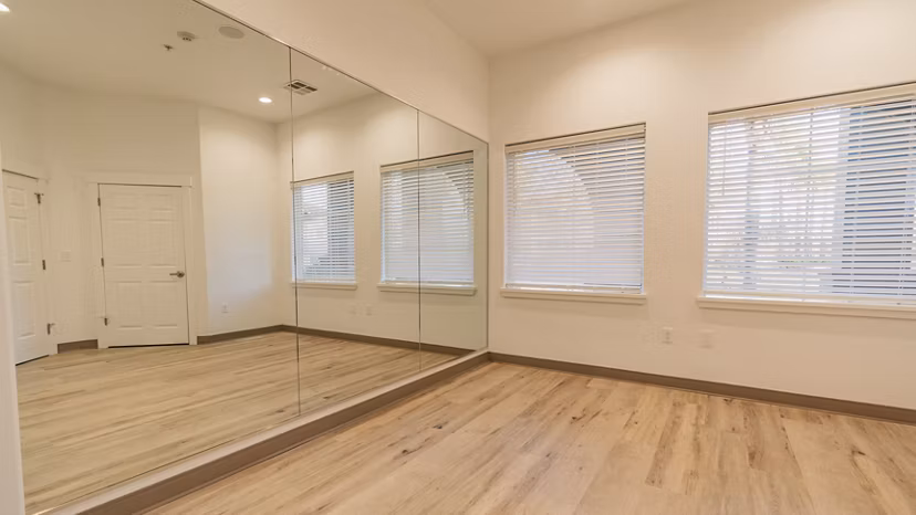 fitness center at Monticello at Southport Apartments