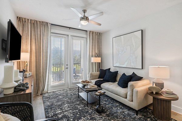 living room at The Haven at Indigo Square Apartments