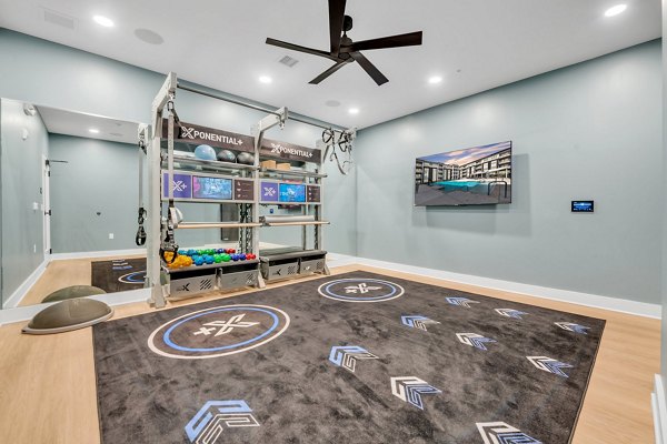 fitness center at Montage at Marquis Hills Apartments