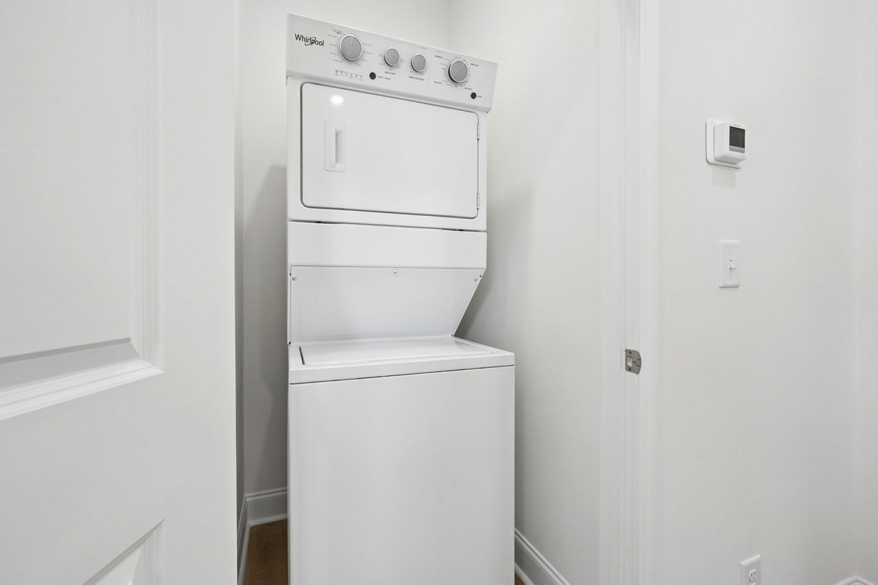 Laundry room at Groves Townhomes