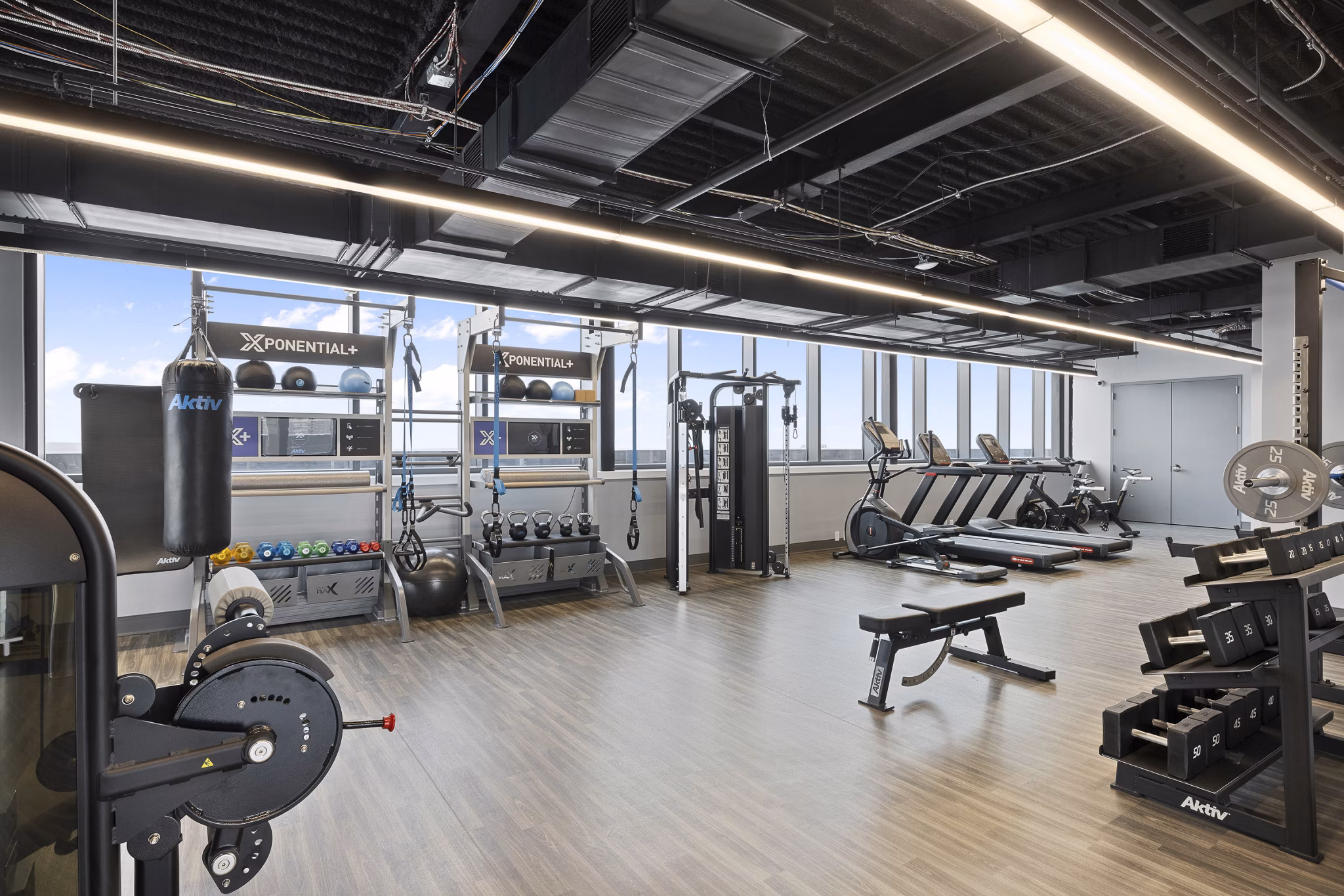 fitness center at The Grandb Apartments