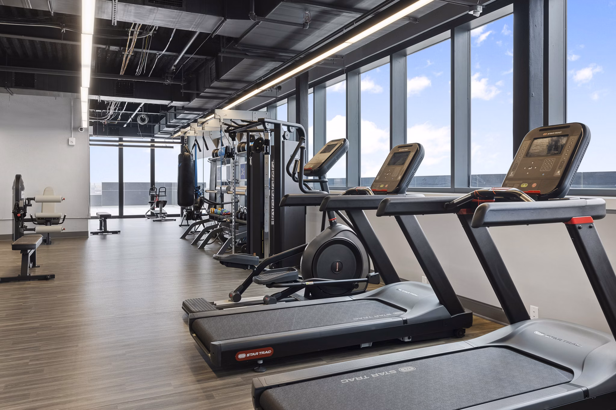 fitness center at The Grandb Apartments