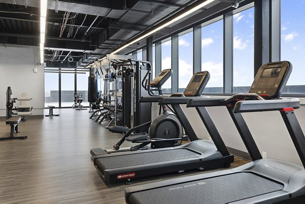 fitness center at The Grandb Apartments