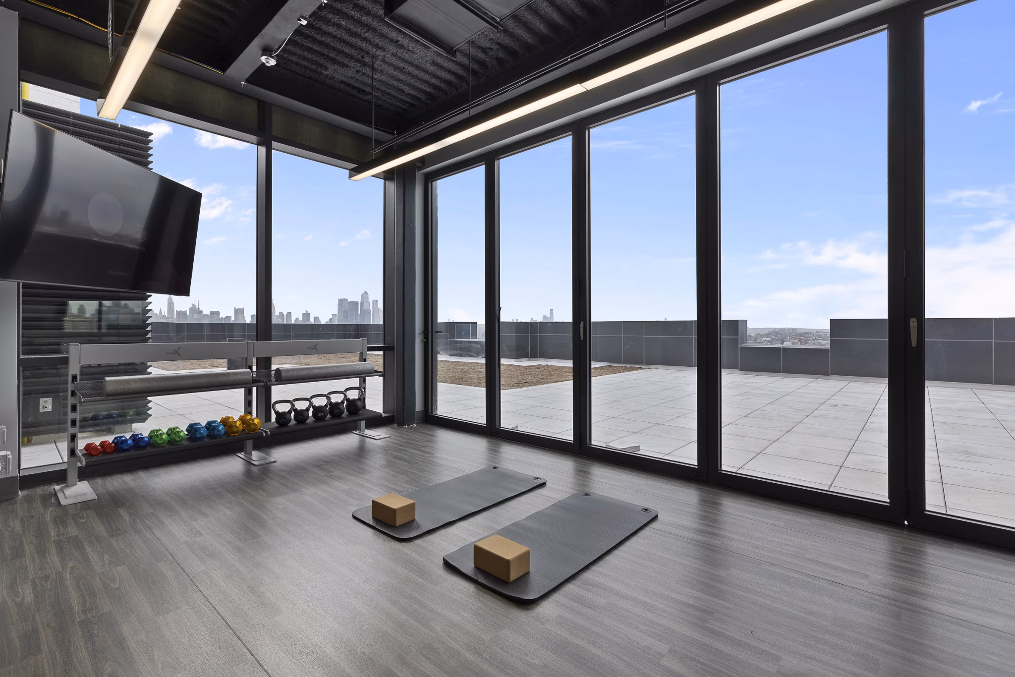 fitness center at The Grand Apartments
