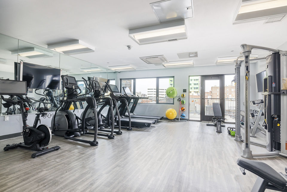 fitness center at The Station Apartments 