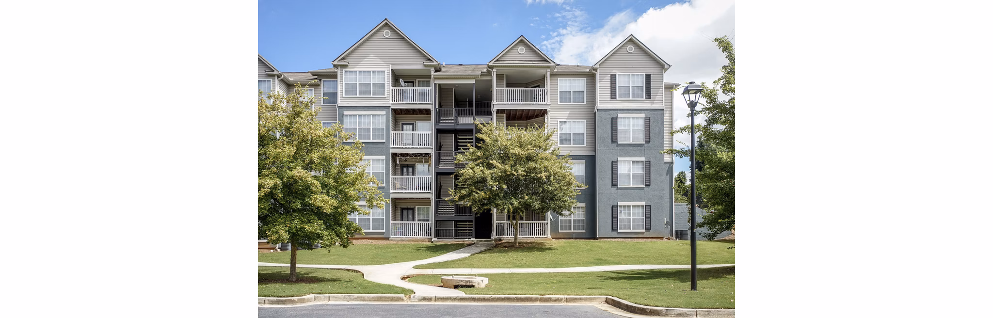 building at Monterey Village Apartments