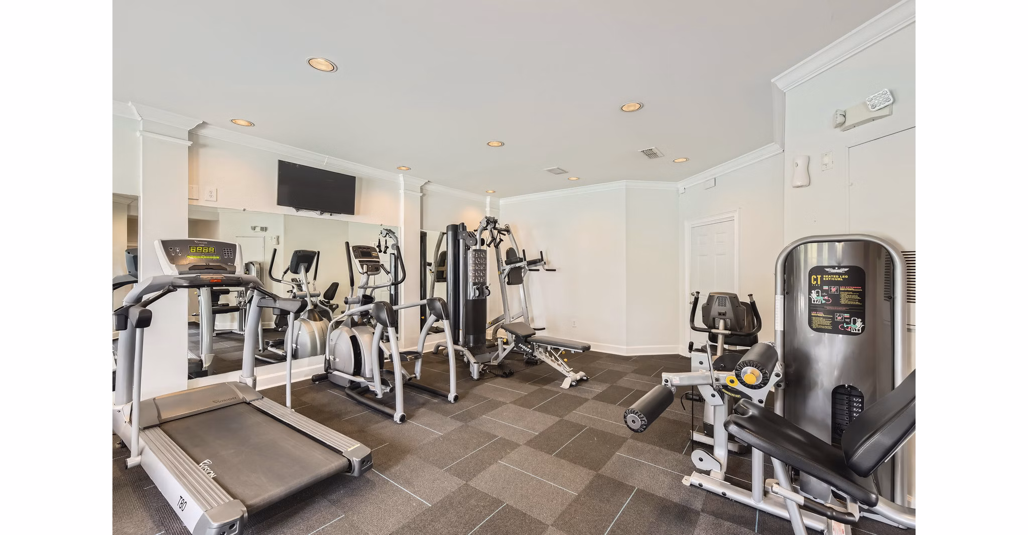 fitness center at Monterey Village Apartments