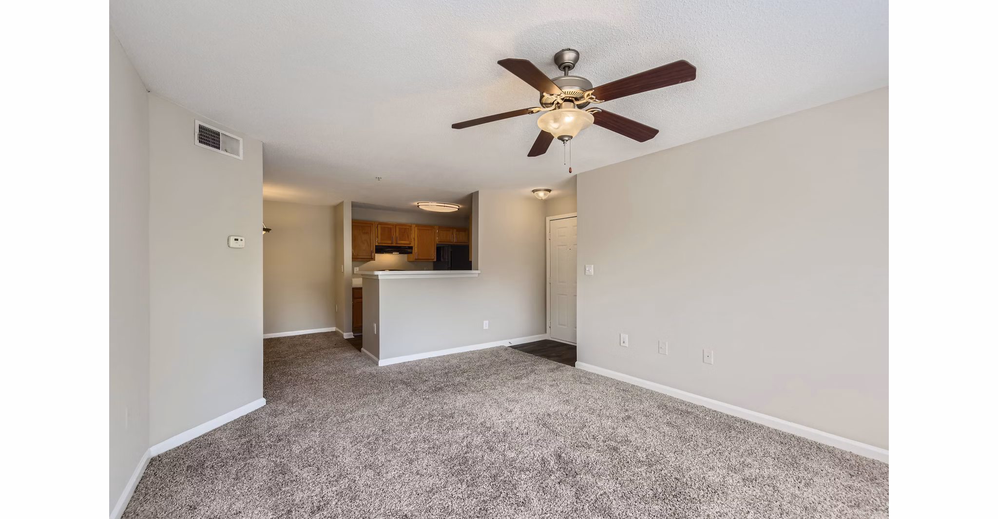 living room at Monterey Village Apartments
