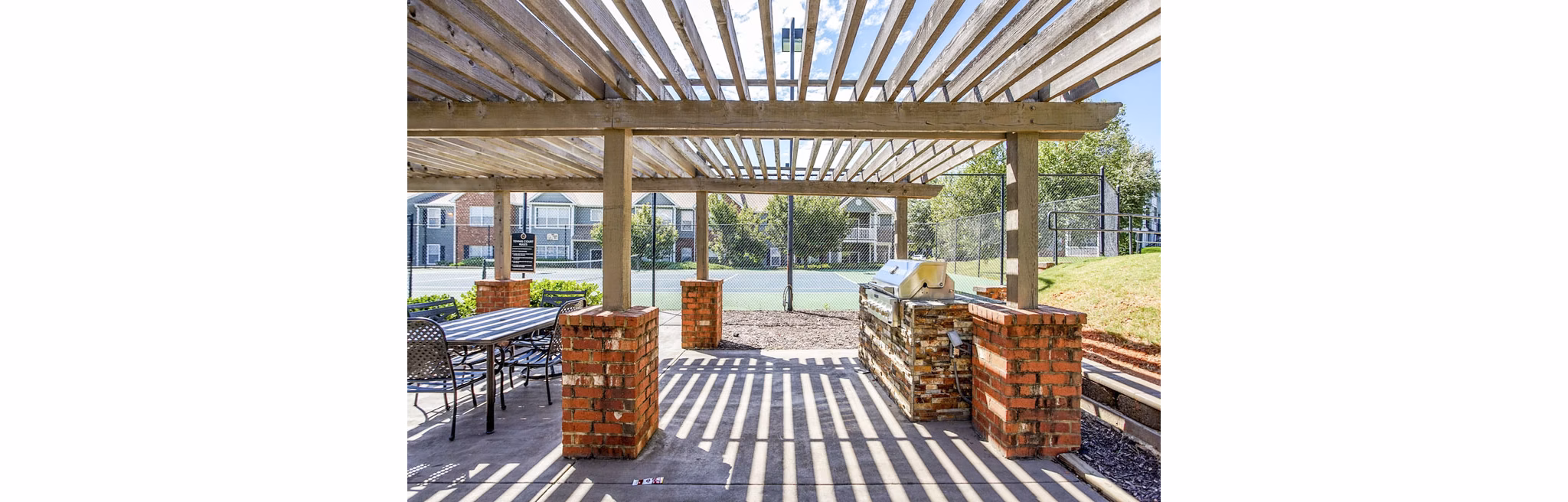 grill area/patio at Eastwood Village Apartments