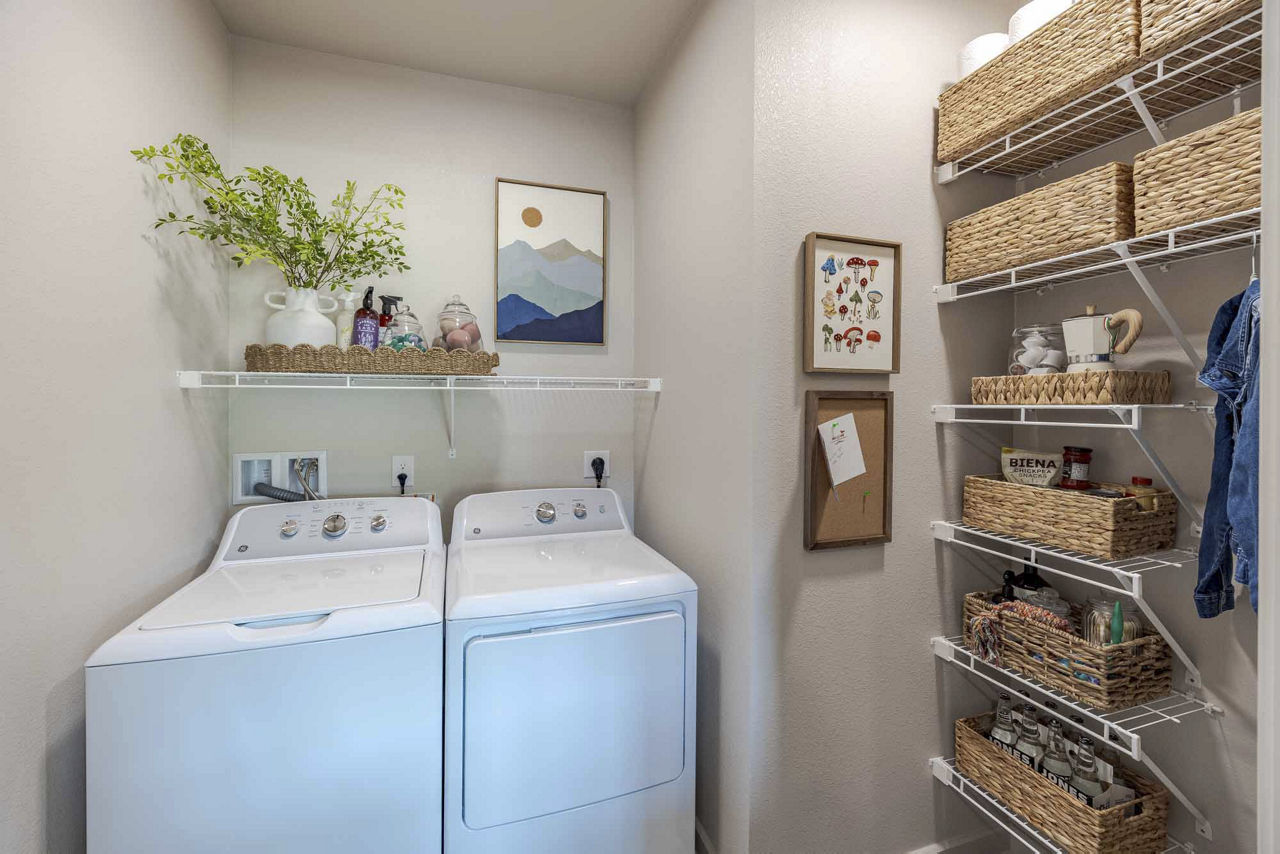Laundry room at Ovation Apartments