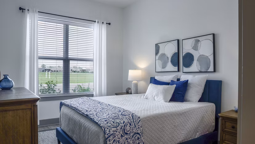 bedroom at The Oaks at Riverbend Apartments 