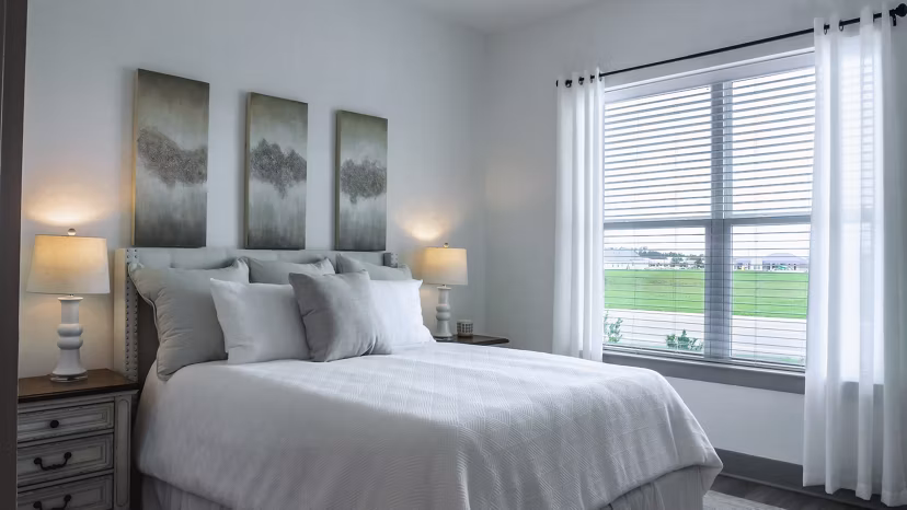 bedroom at The Oaks at Riverbend Apartments 