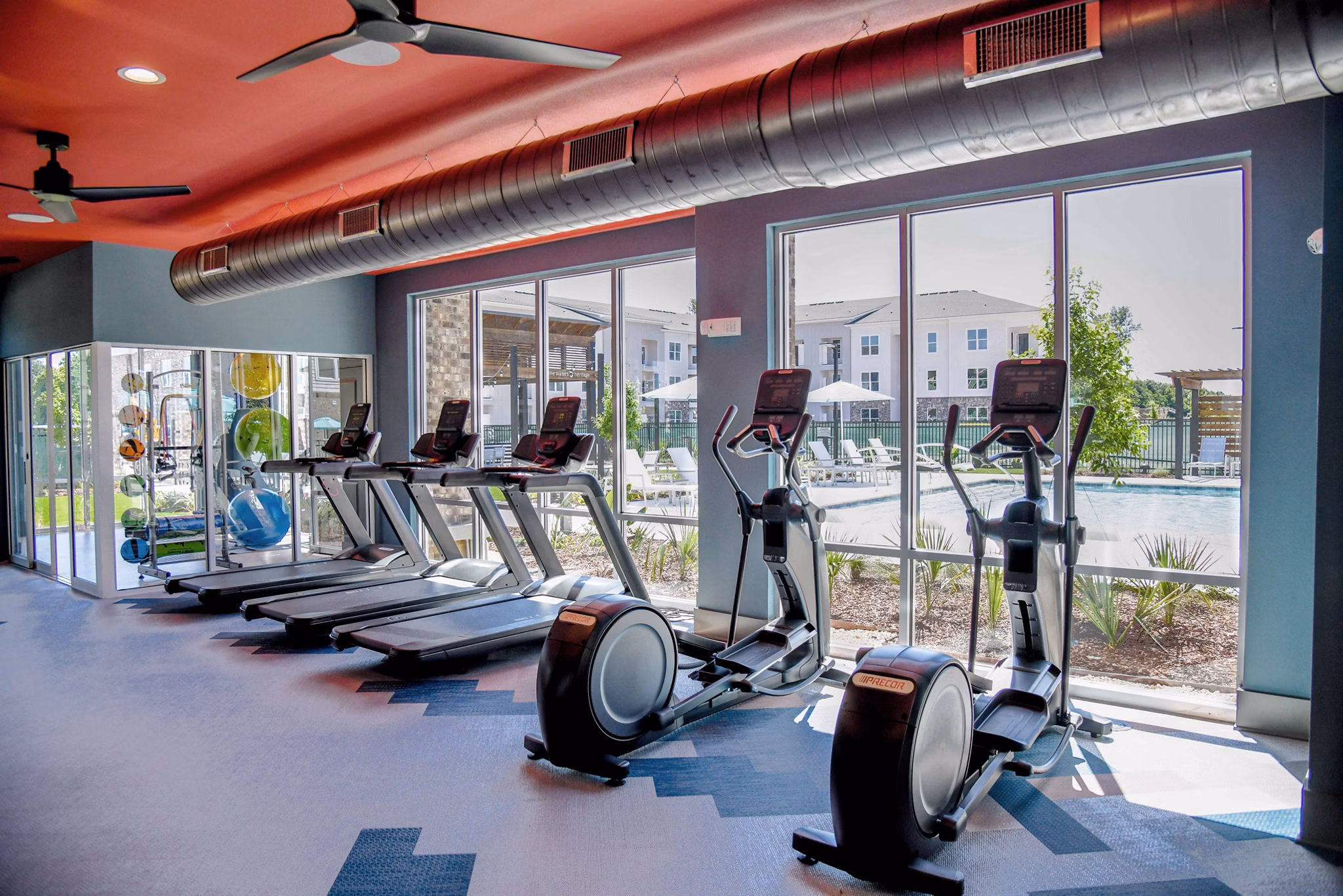 fitness center  at The Oaks at Riverbend Apartments 