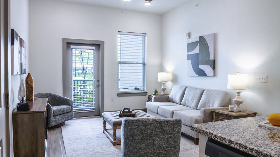 living room at The Oaks at Riverbend Apartments 