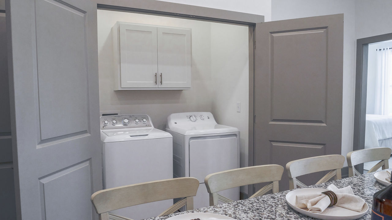 Laundry room at The Oaks At Riverbend