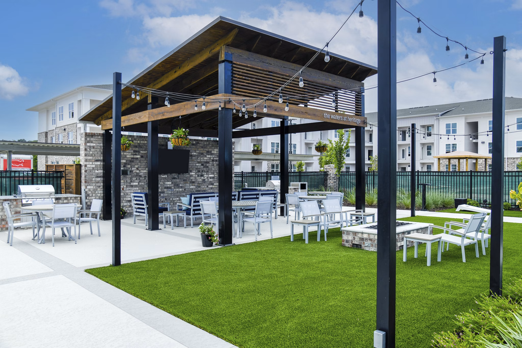 grill area at The Oaks at Riverbend Apartments 