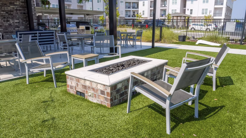 grill area at The Oaks at Riverbend Apartments 