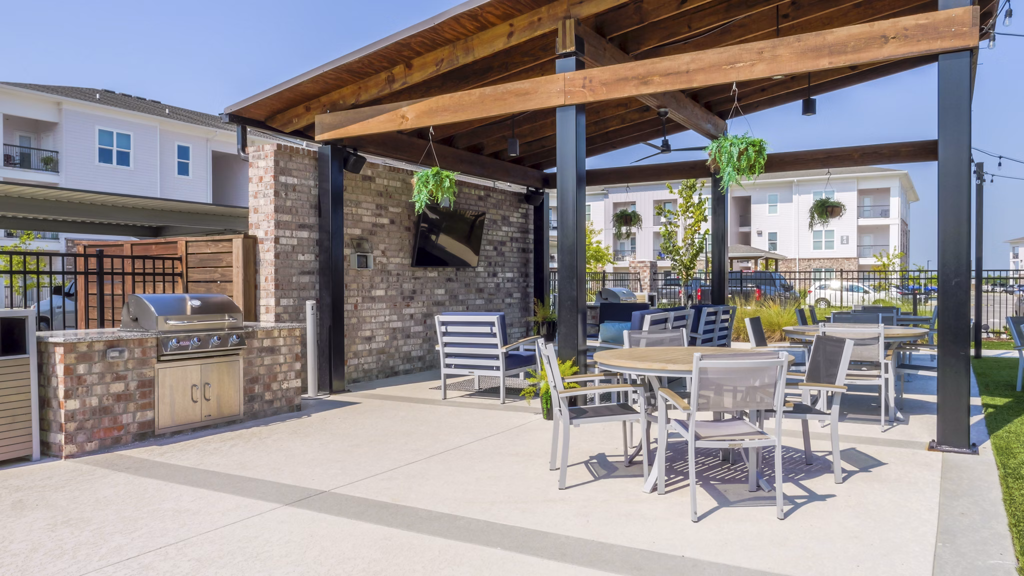 grill area at The Oaks at Riverbend Apartments 
