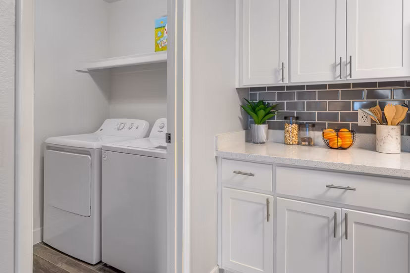 laundry room at Station 21 Apartments