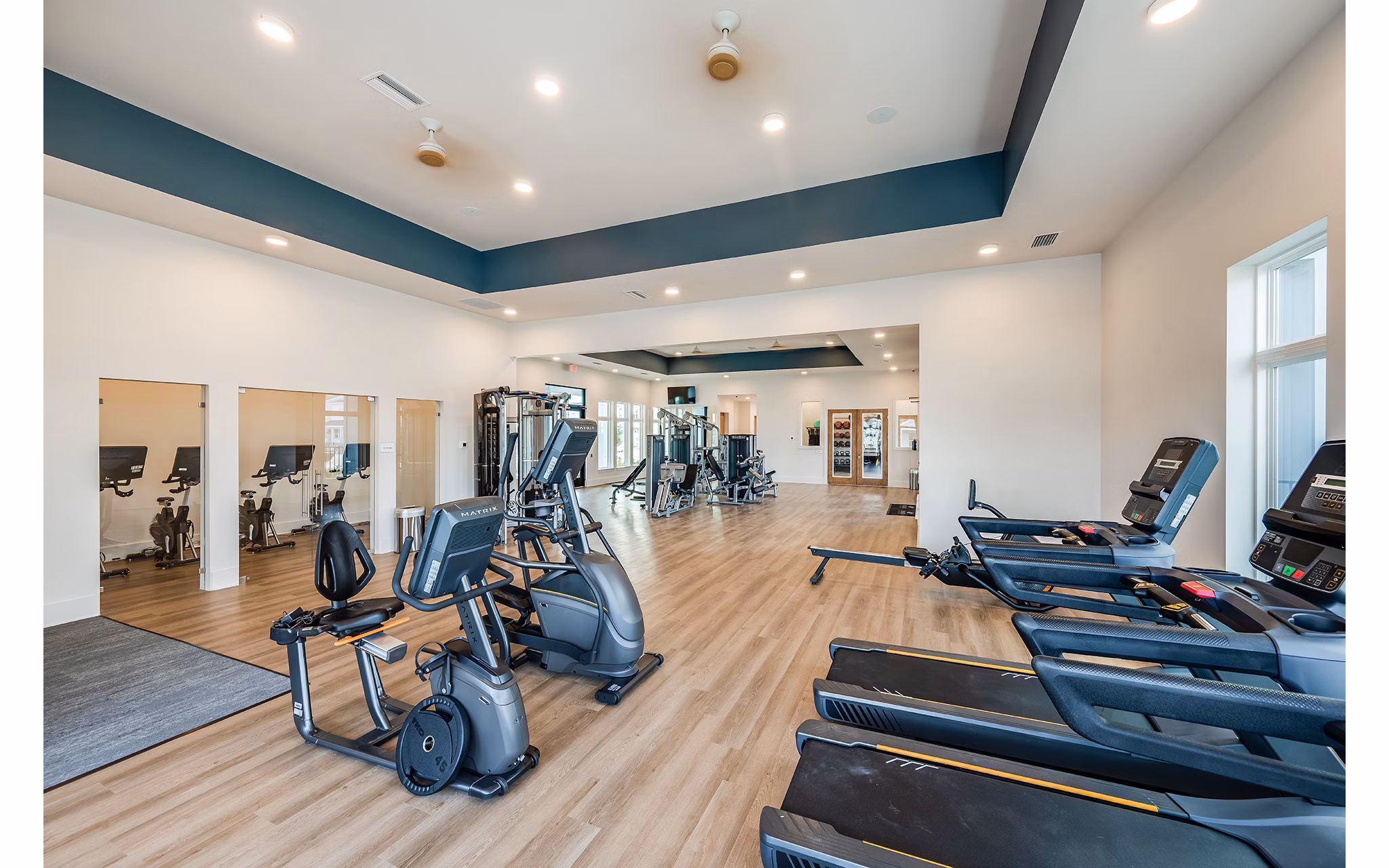 fitness center at Abrazo at Four Corners Apartments 