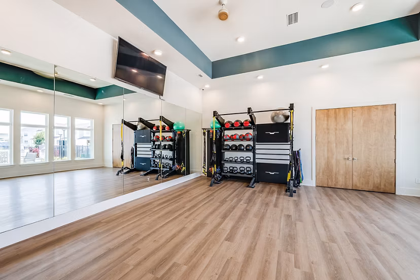 fitness center at Abrazo at Four Corners Apartments 