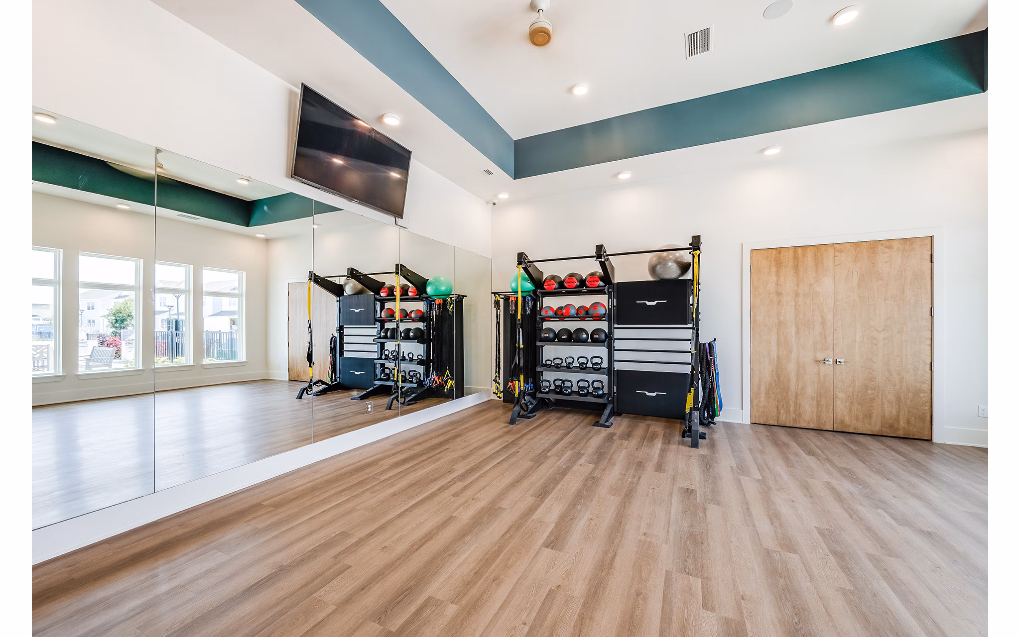 fitness center at Abrazo at Four Corners Apartments 