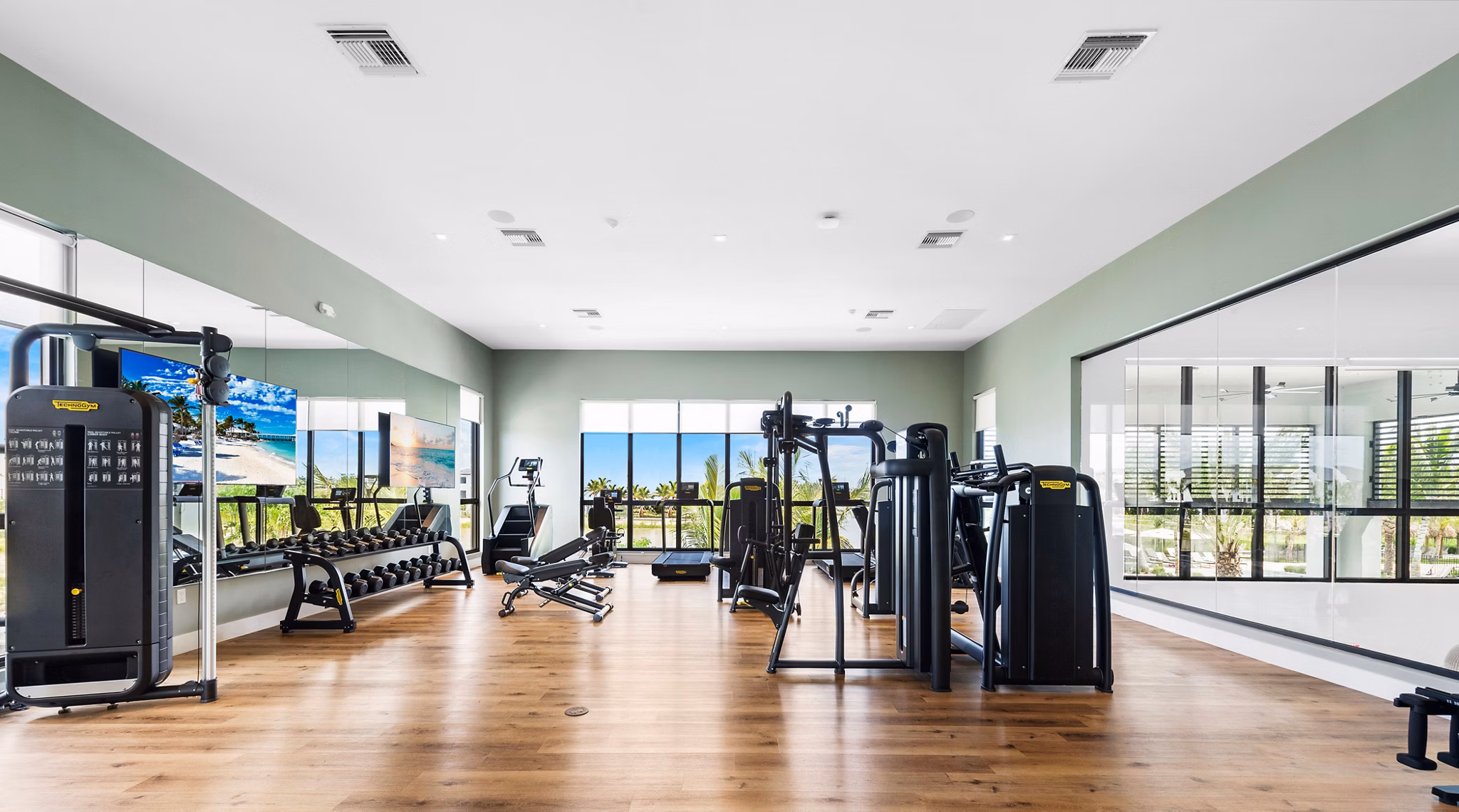 fitness center at Natura Gardens Apartments 