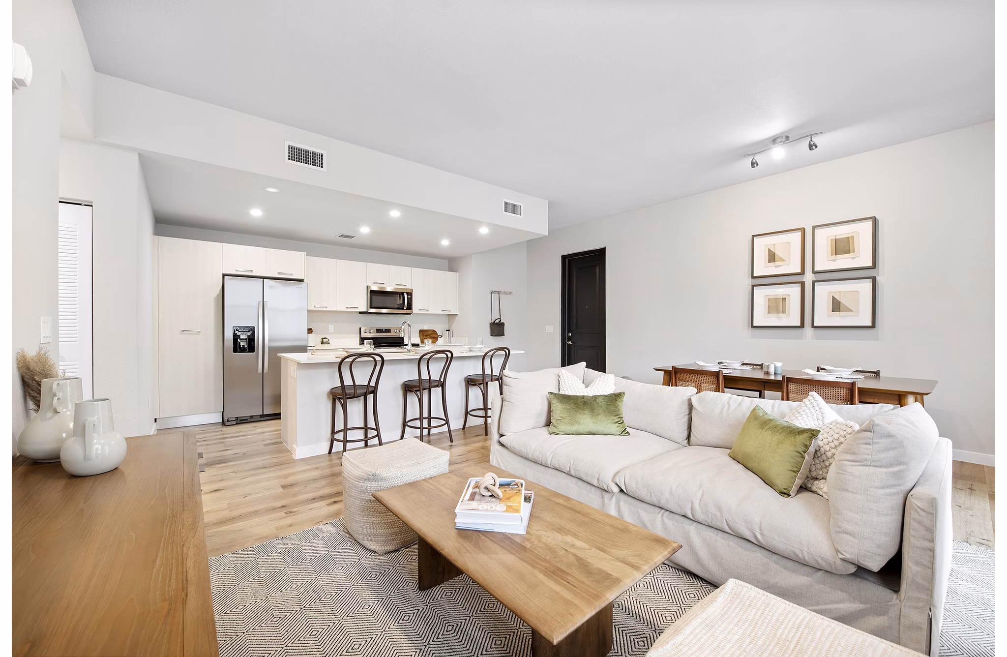 living room at Natura Gardens Apartments 