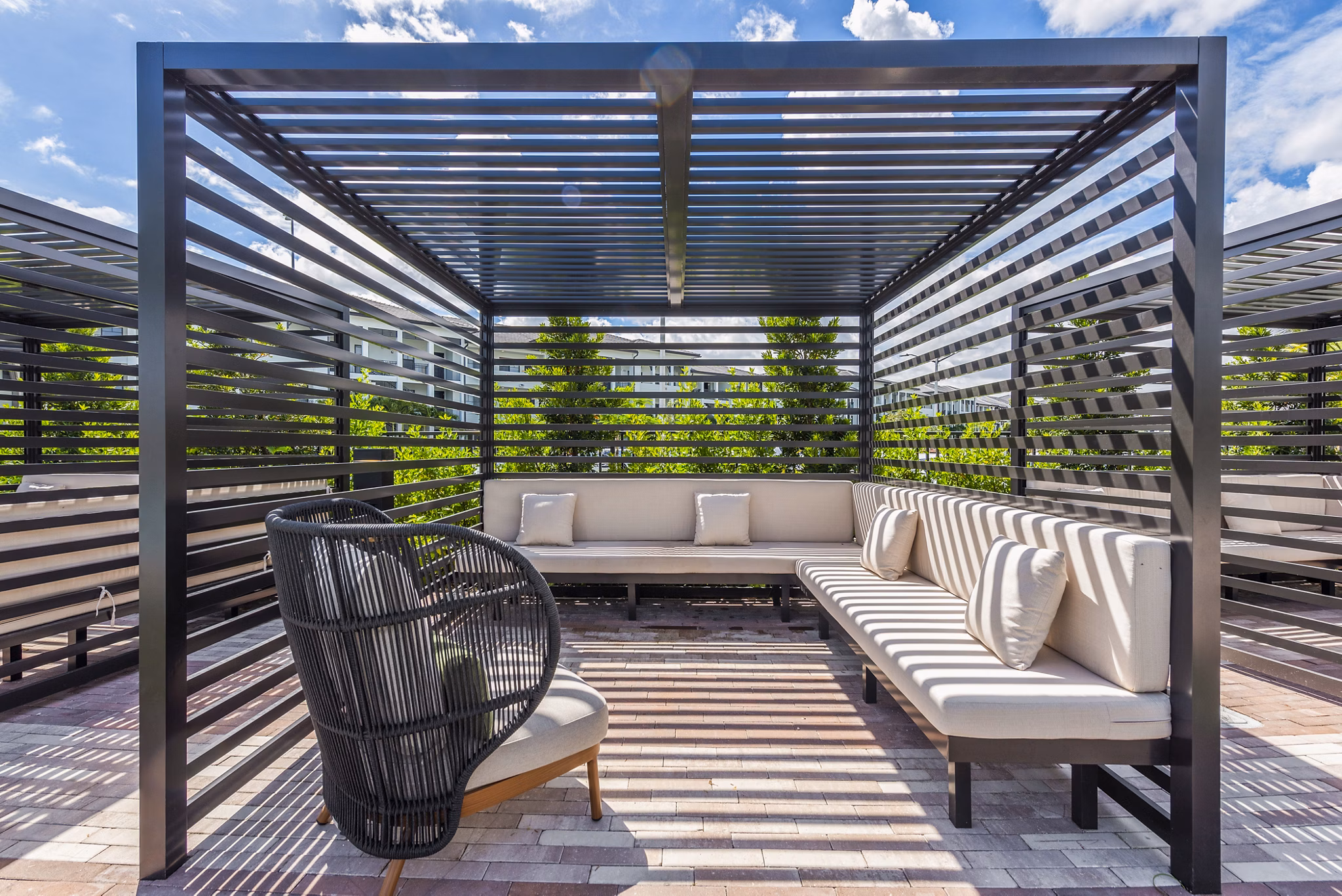 grill area at Natura Gardens Apartments 