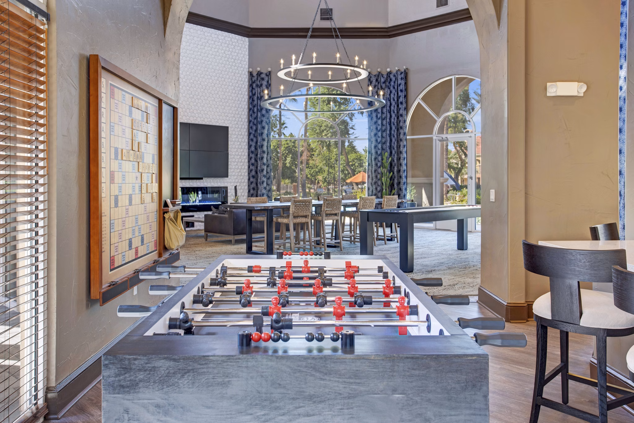 clubhouse game room at The Academy Apartments
