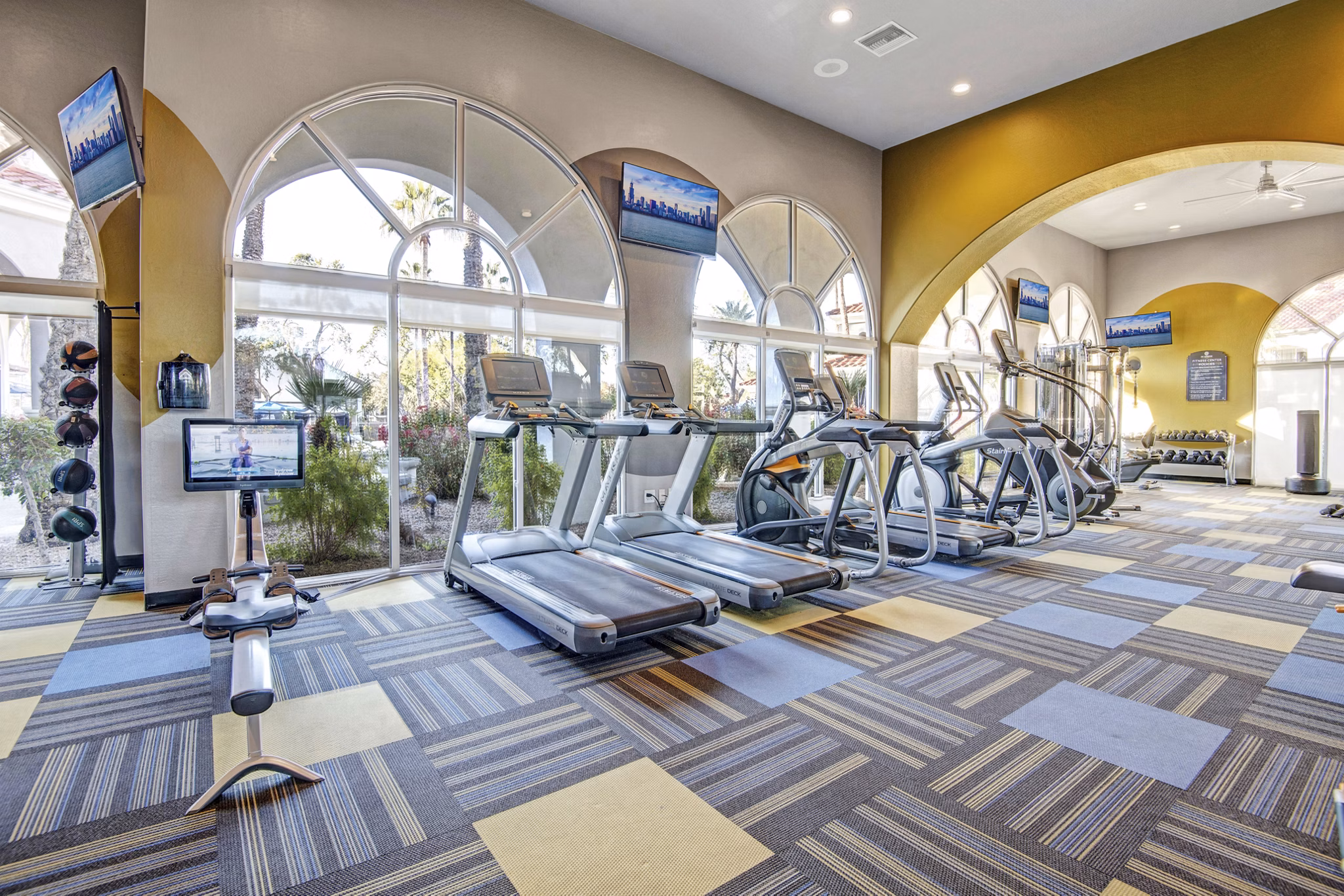 fitness center at The Catherine Apartments