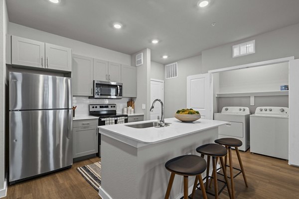 kitchen at Peak at 1385 Apartments