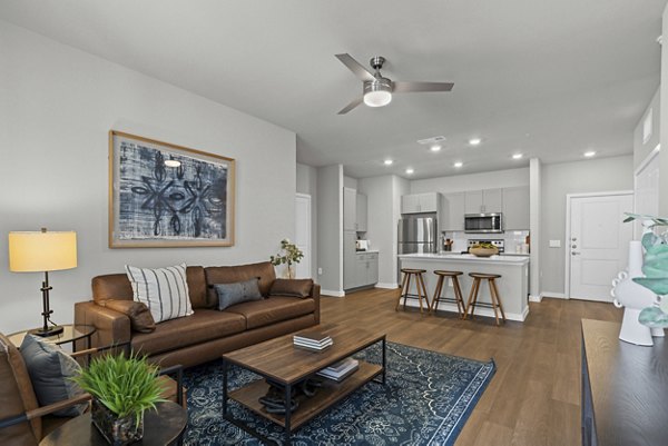 living room at Peak at 1385 Apartments