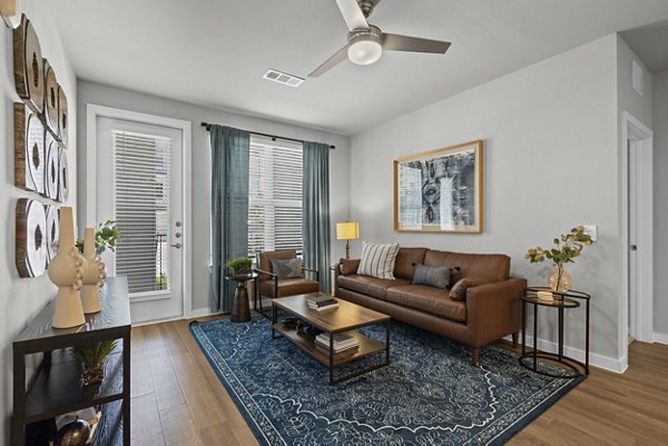 living room at Peak at 1385 Apartments