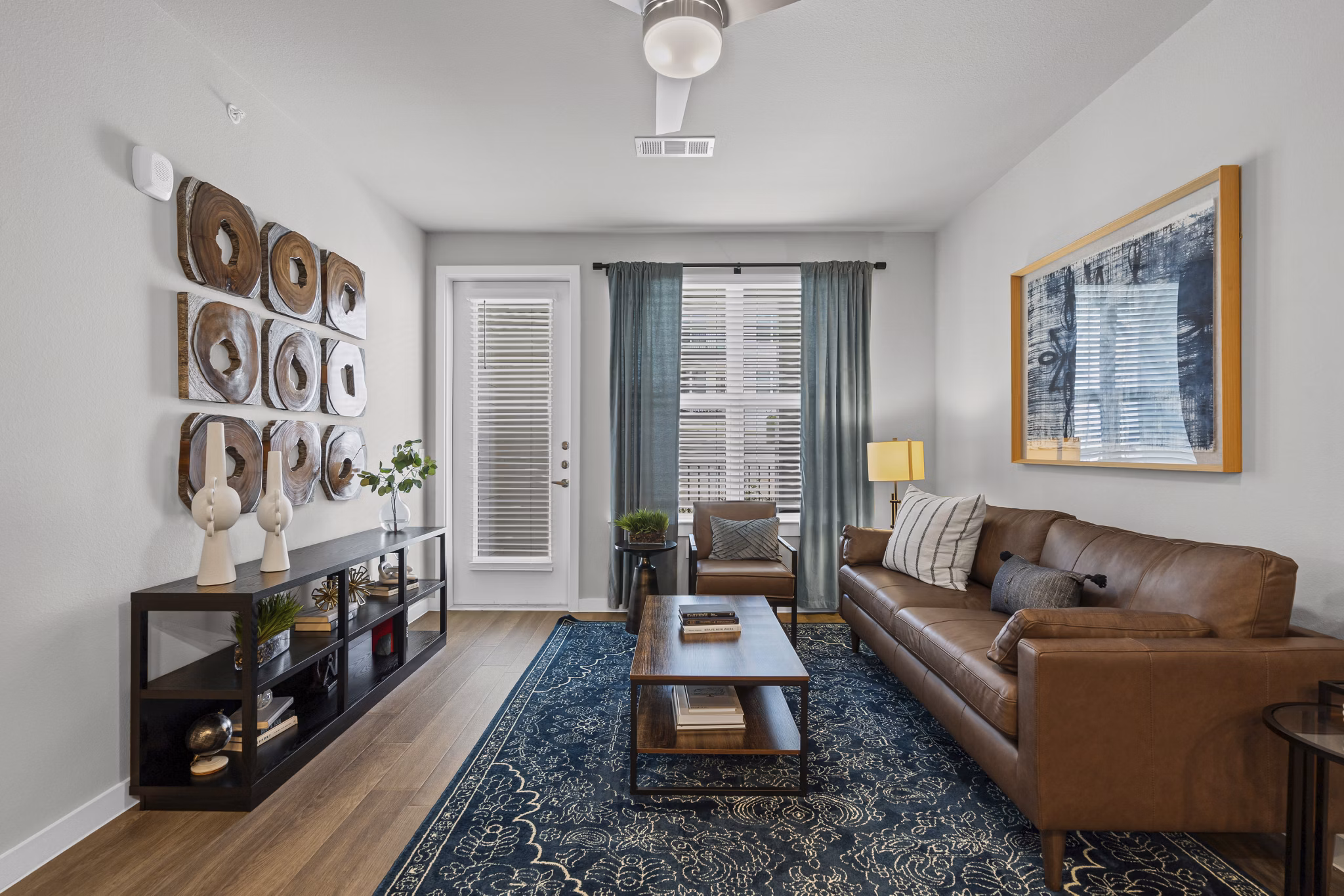 living room at Peak at 1385 Apartments