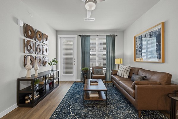 living room at Peak at 1385 Apartments