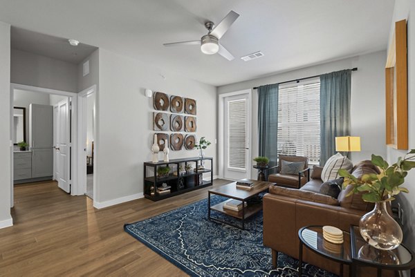 living room at Peak at 1385 Apartments