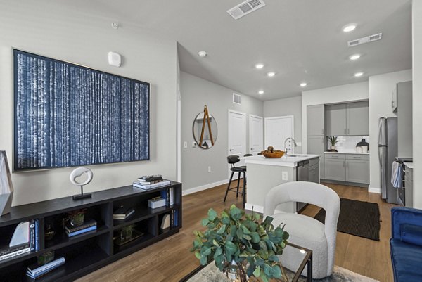living room at Peak at 1385 Apartments