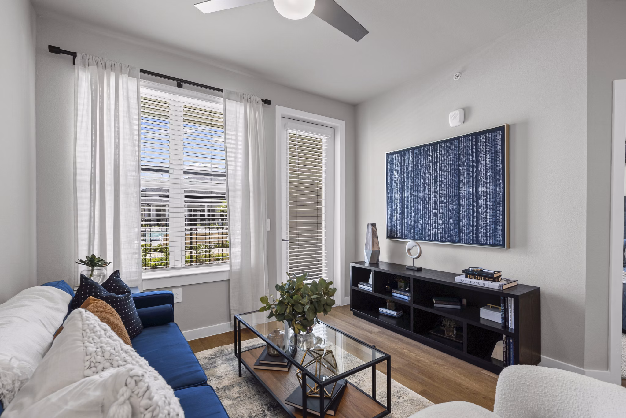 living room at Peak at 1385 Apartments