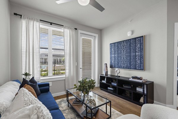 living room at Peak at 1385 Apartments
